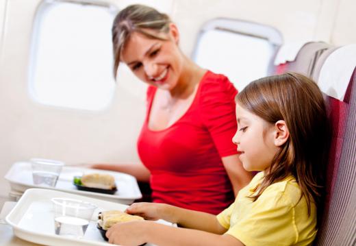A purser may ensure that flight attendants properly distribute food and drinks to passengers.
